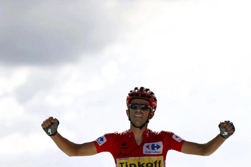 Flamboyant Contador tops Froome this time