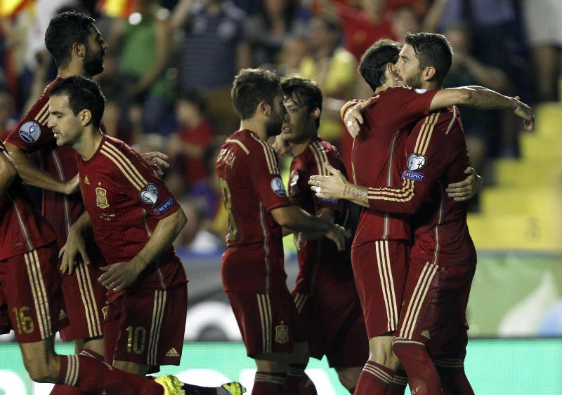 Spain opens Euro qualifying with big win; England takes control of Group E