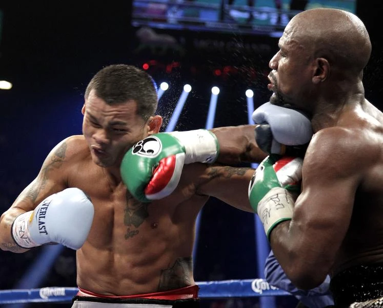 Mayweather goes 47-0 after winning Maidana rematch