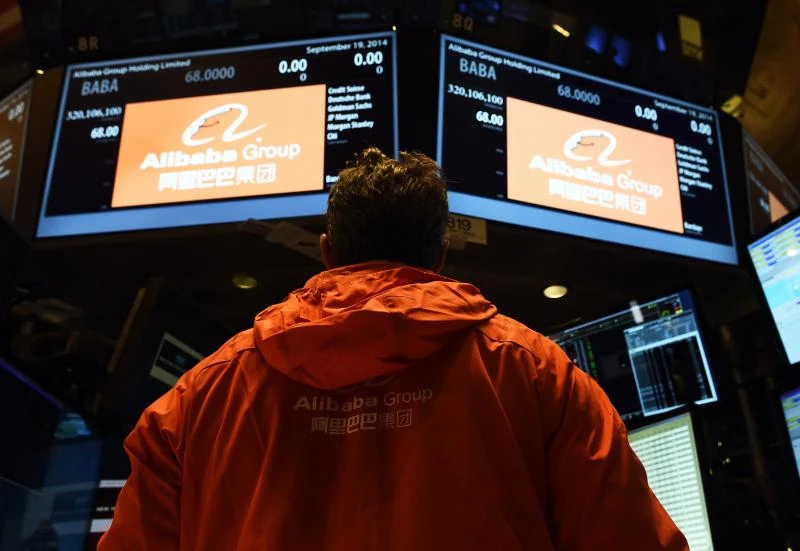 Alibaba jumps more than 40% in trading debut