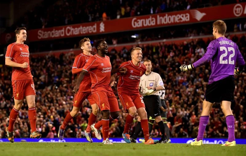 Liverpool survives Boro shoot-out marathon; Arsenal crashes