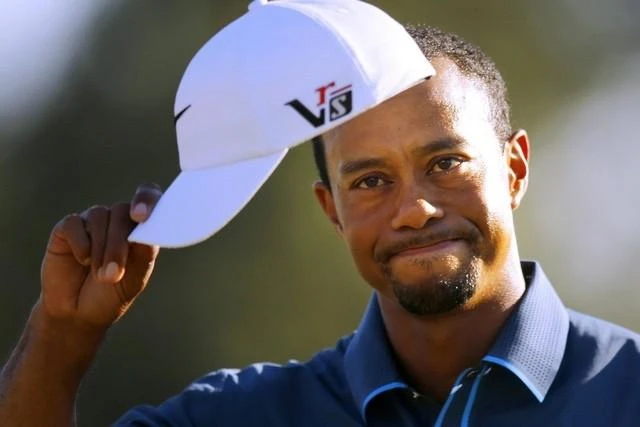 Woods says strength is back, but not swing
