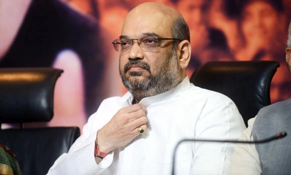 India's ruling party head charged with causing religious tensions
