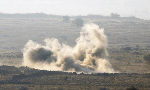 Syria army, rebels clash as UN bids to free Golan monitors