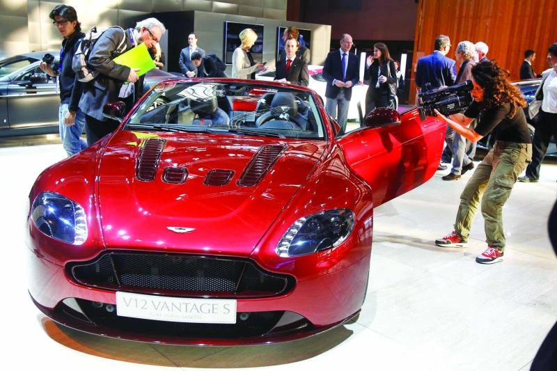 Aston Martin sees small recovery as 2013 loss shrinks by a third