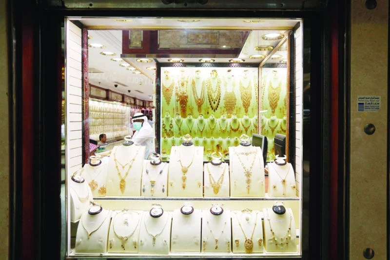 Gold prices near 15-month low