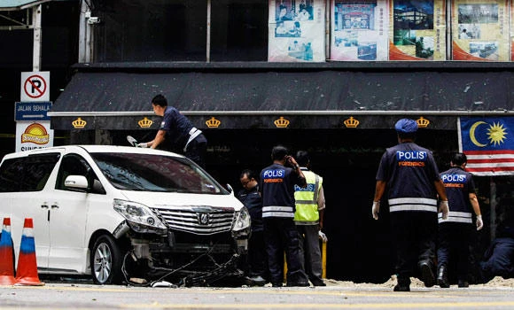 Malaysia detains 14 suspected militants
