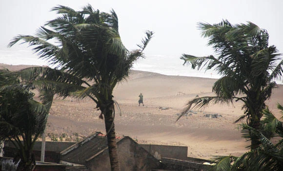 Three die as Cyclone Hudhud lashes India; typhoon hits Japan