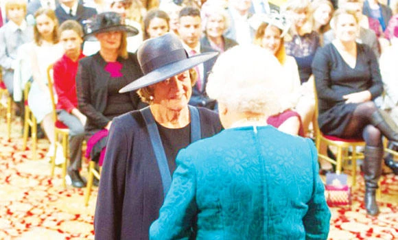 Actress Smith honored by Britain’s Queen