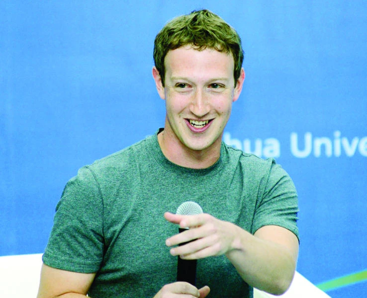 Students cheer as Facebook founder speaks Chinese