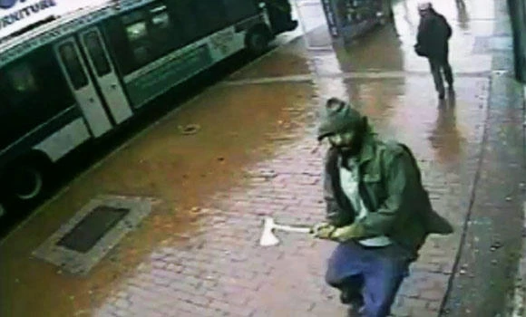 Officer critical but stable after hatchet attack