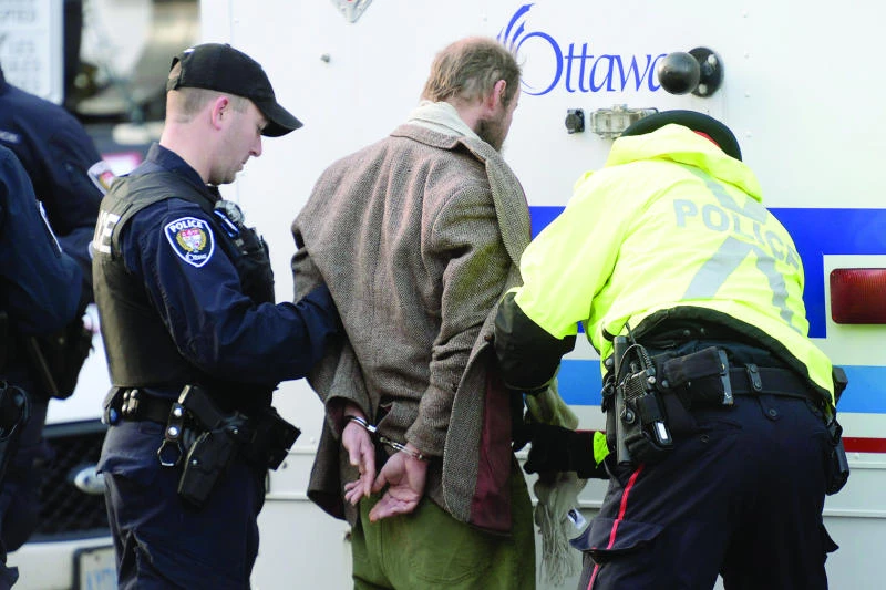 Canadians seek to understand Parliament shooting
