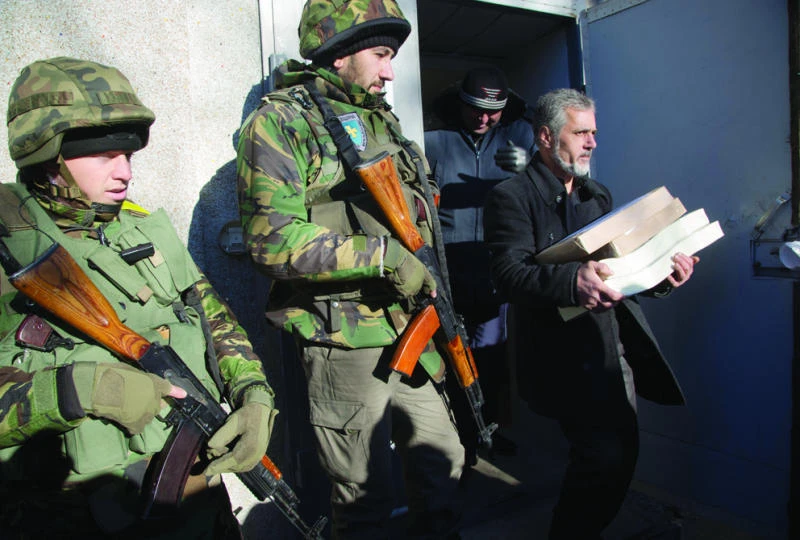Ukraine readies to vote under shadow of war
