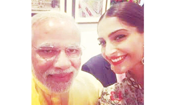 Celebs go on selfie spree with Modi