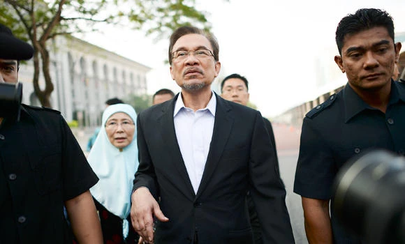 Malaysian opposition leader says charges are ‘fabrications’