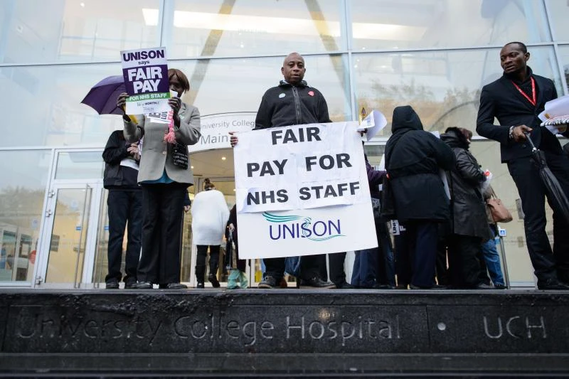 English health workers stage first strike for 32 years