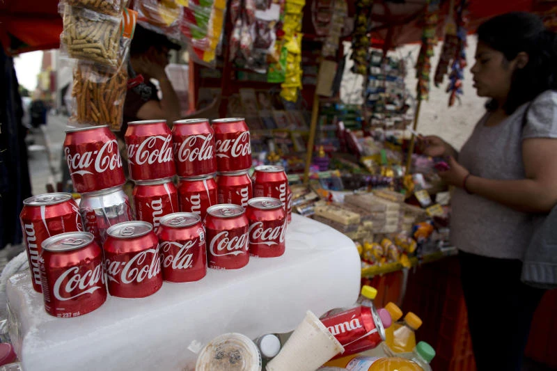 Coke income falls in Q3, hit by slow economies, forex