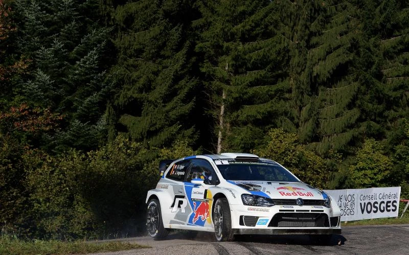 Ogier’s title bid on hold after engine trouble