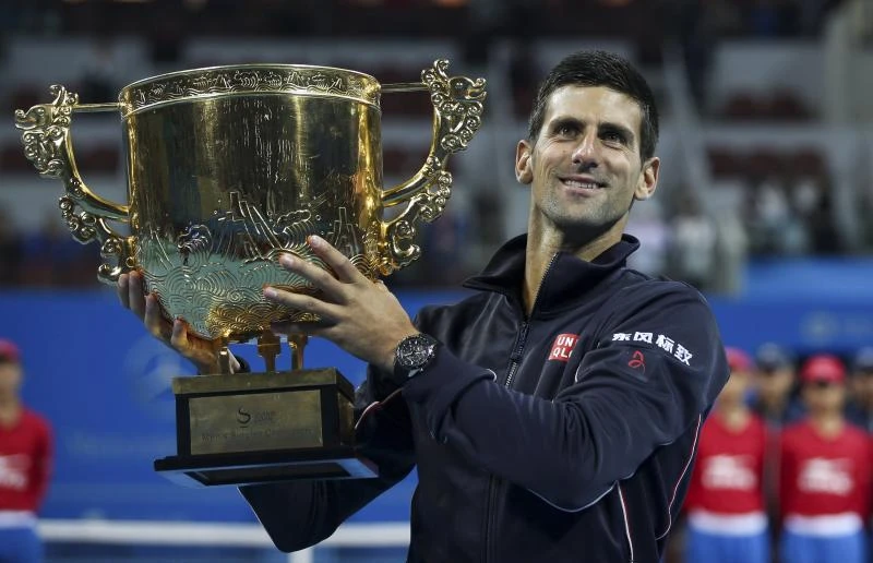 Djokovic, Sharapova reign in China