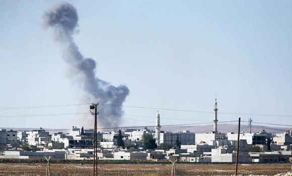 Airstrikes hit jihadists near embattled Syria town