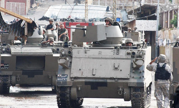 Lebanon army enters militant refuge after thousands flee