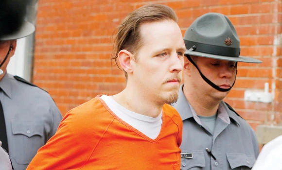 Trooper ambush suspect in court after long manhunt