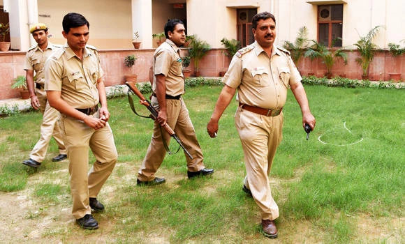 India woman stripped, paraded on donkey as punishment