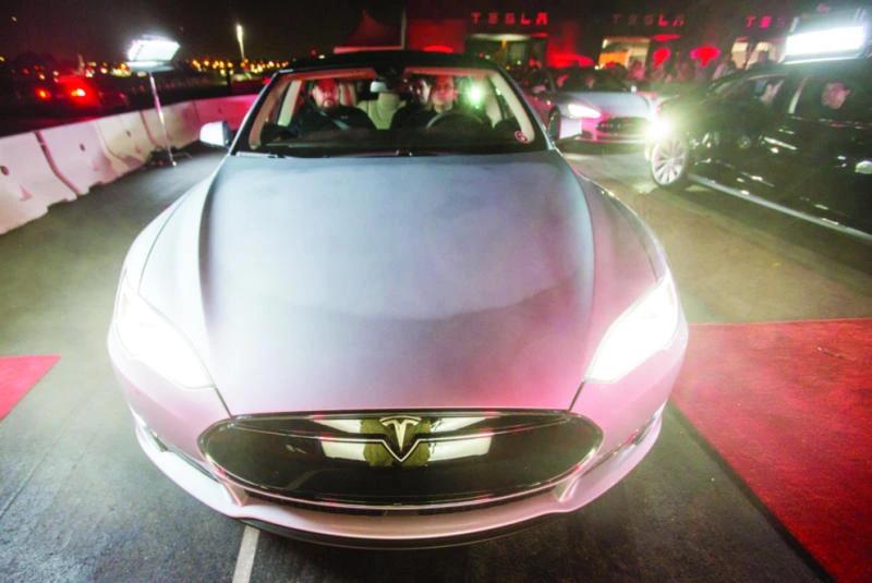 Tesla sets new record for deliveries, but losses mount