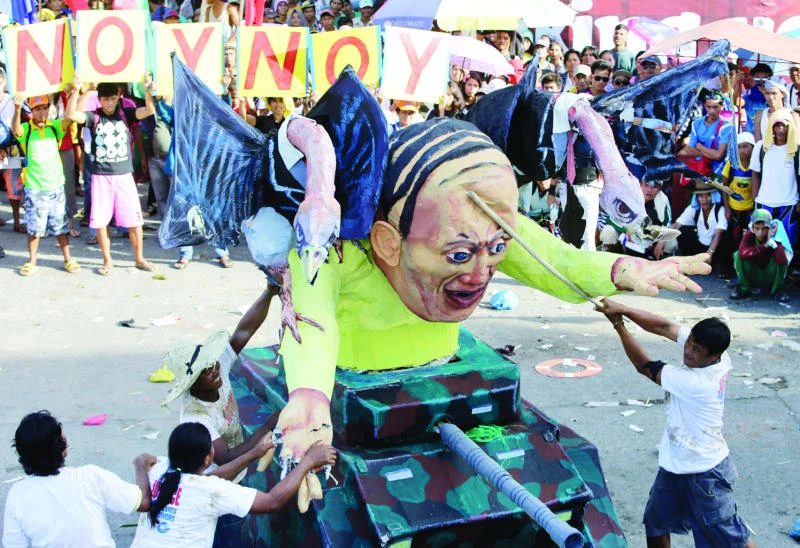 Prayers, tears in Philippines one year after Typhoon Haiyan