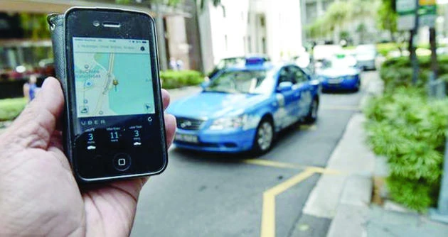 Singapore moves to regulate taxi booking applications