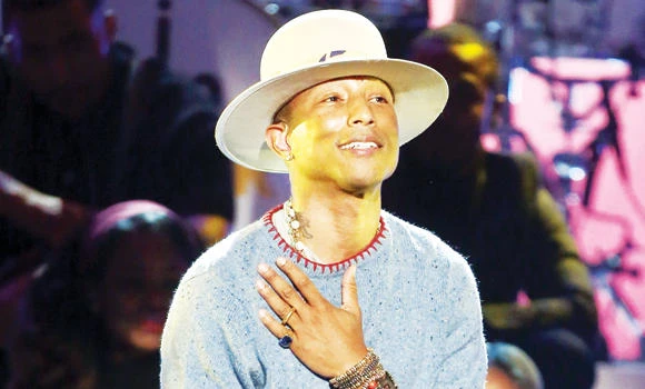 Pharrell sings and dances for Chanel