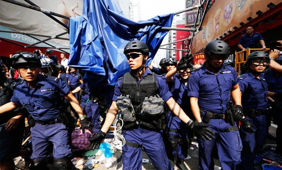 Hong Kong police clear protest site, arrest student leaders