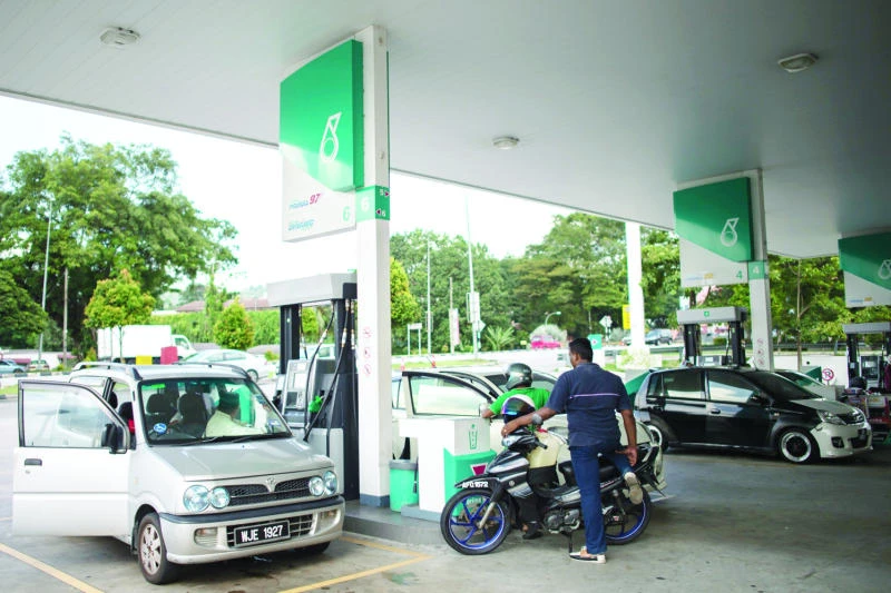 Petronas third quarter profit slides