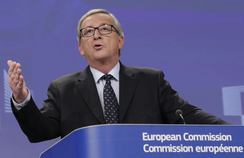 EU vows tax reform as Juncker heads to Brisbane