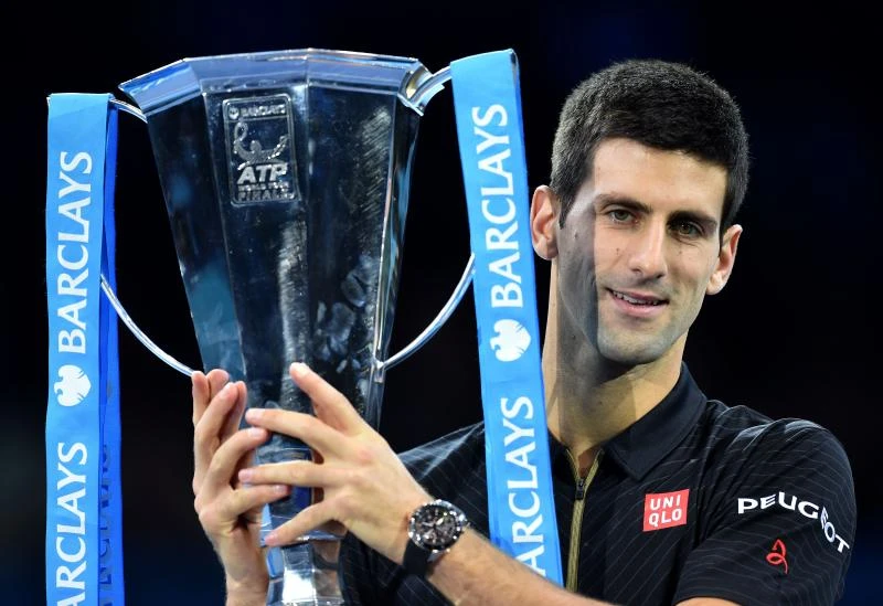 Djokovic wins year-ender as Federer pulls out