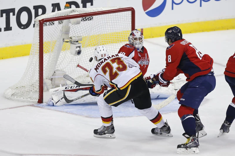 Flames gobble up Capitals 4-3 in overtime