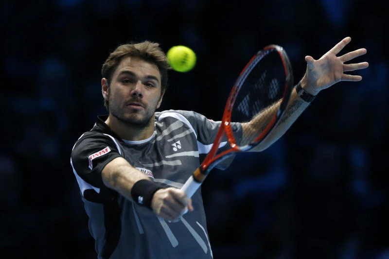 Ruthless Wawrinka routs Berdych in Finals opener