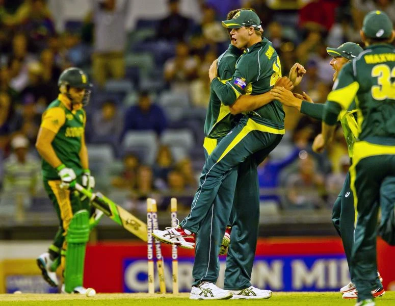 Clarke injured as Australia wins ODI opener
