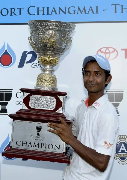 Khan hangs tough to take Thai title