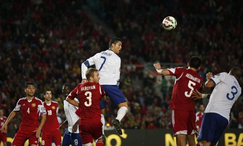Germany struggles; as Ronaldo sets goal record; Greece humiliated