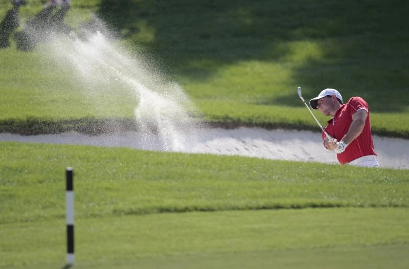 Irish duo McIlroy, Lowry share lead in Dubai