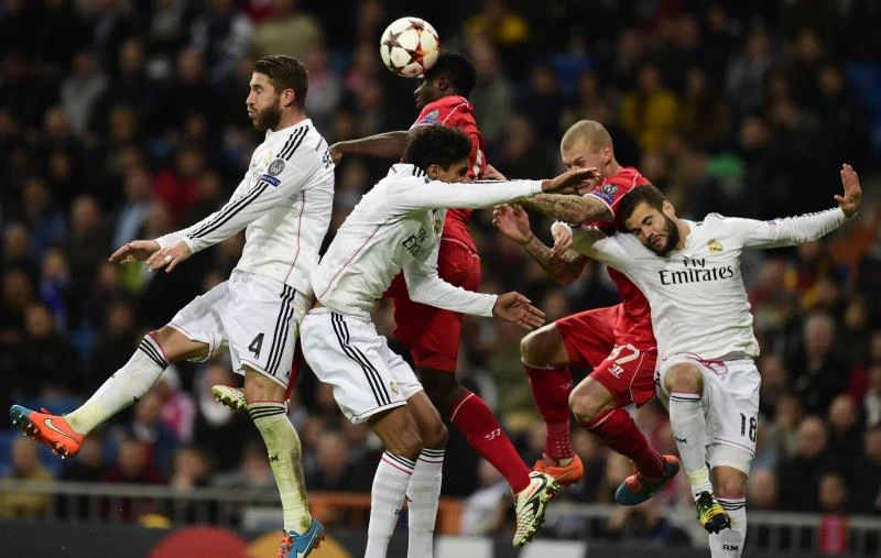 Real Madrid, Dortmund ease into last 16
