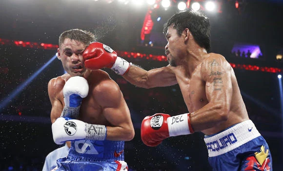 Pacquiao knocks Algieri down 6 times, dominates