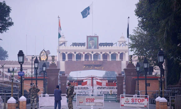 India, Pakistan lower flag at border ceremony day after deadly attack