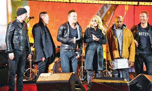 Springsteen, Martin fill in at U2 AIDS show