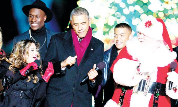 Obama praises US troops at White House music show