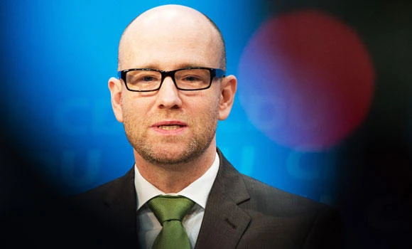 German party backs off language demand