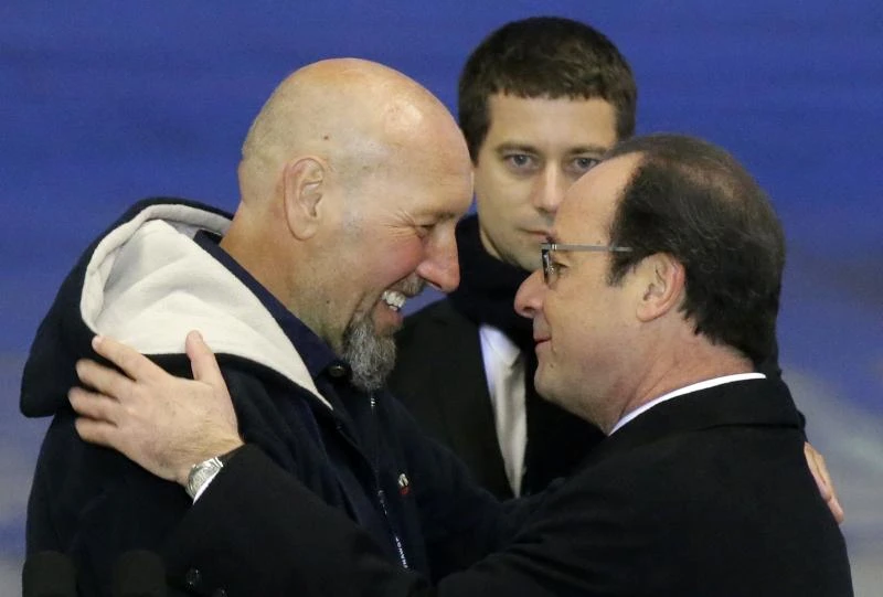 French hostage returns home