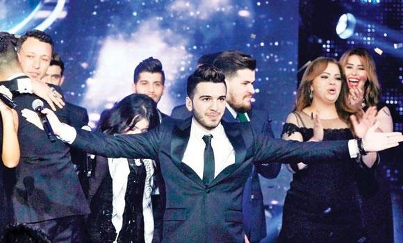 Syrian wins Arab Idol, keeps clear of politics