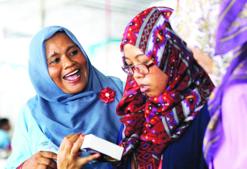 10 years on, tsunami survivors in Indonesia hope to move on